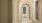 hallway with marble floors and runners